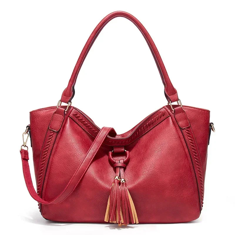 Cross-border new simple commuter crossbody bag, large-capacity handbag, women's shoulder bag, middle-aged tassel women's bag  Amaijoin